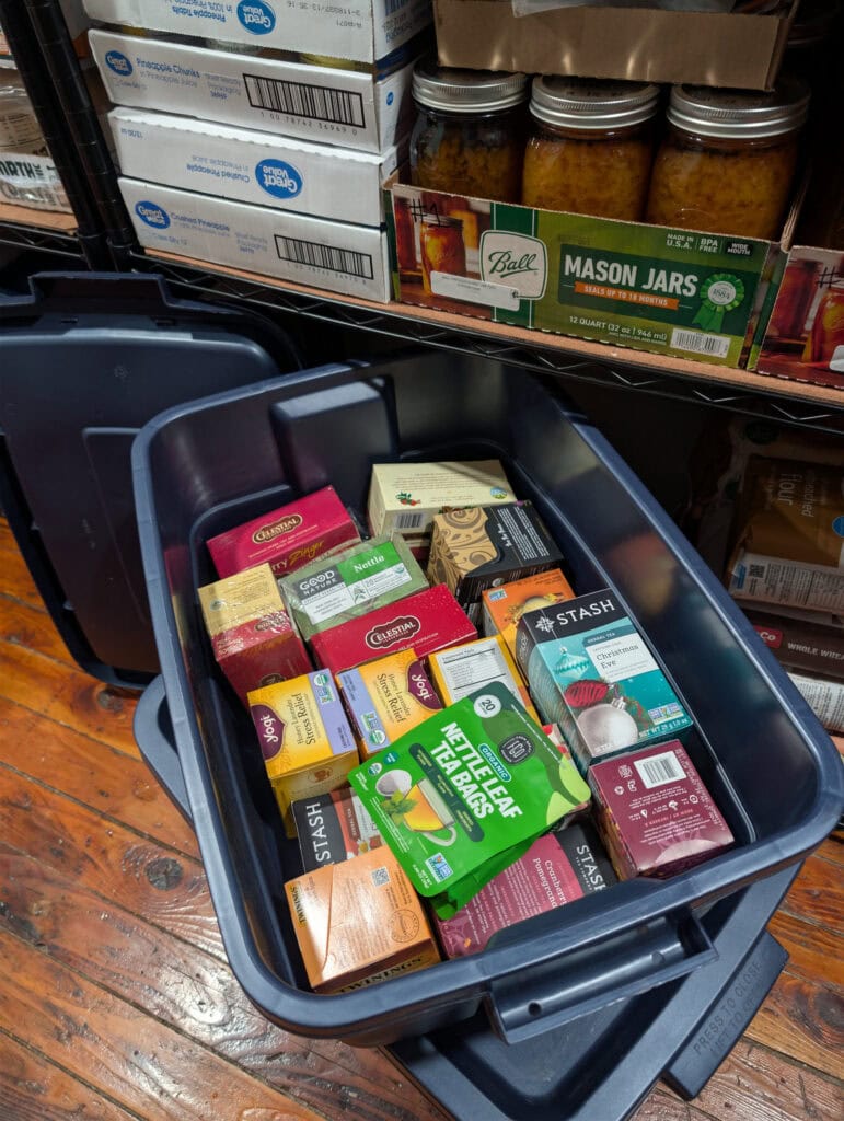 Tote and pantry shelf full of boxed and canned goods