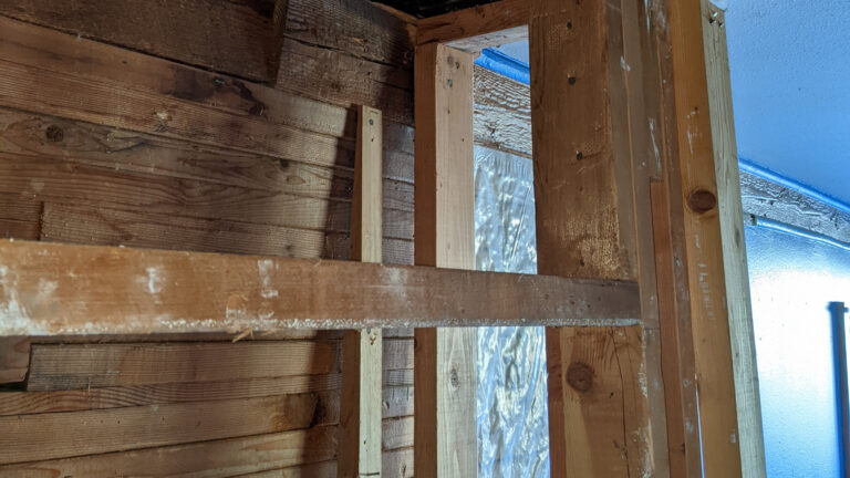 Stacked 2x4 wall that is structurally unsound